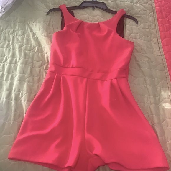 Coral dressy Coral romper with black lace in the back . - Picture 1 of 3